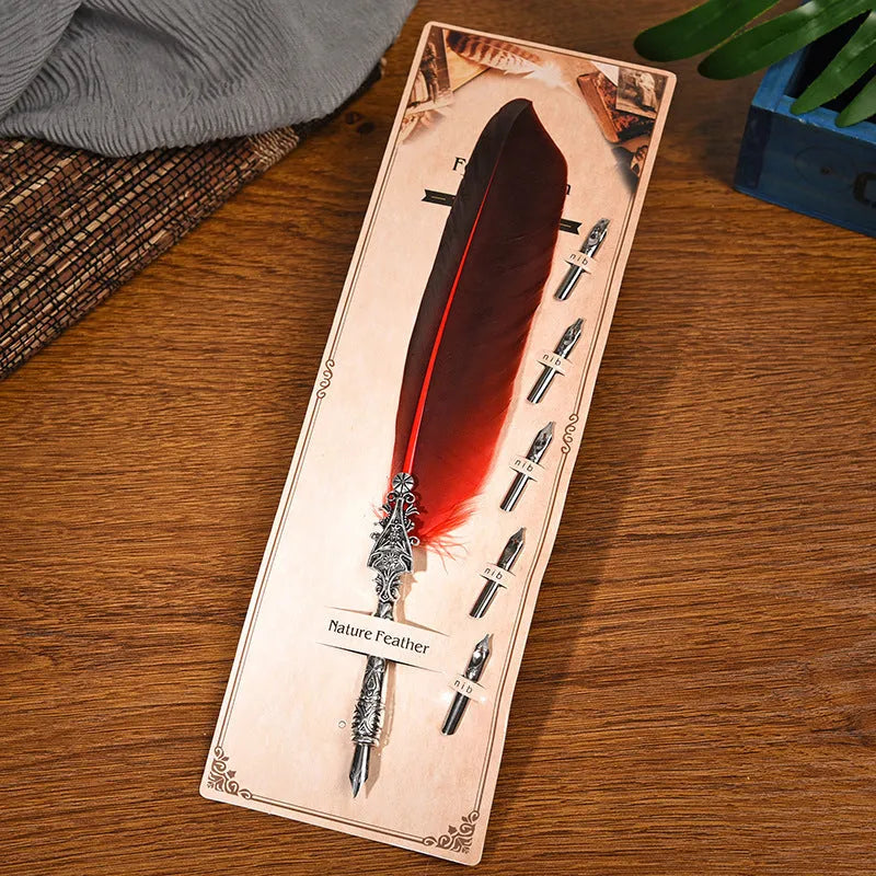 Vintage feather dip pen with zinc alloy shell in various colour options on a desk.