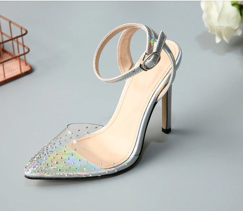 Women's pointed toe stiletto sandals with diamond embellishments on PVC upper, showing side view