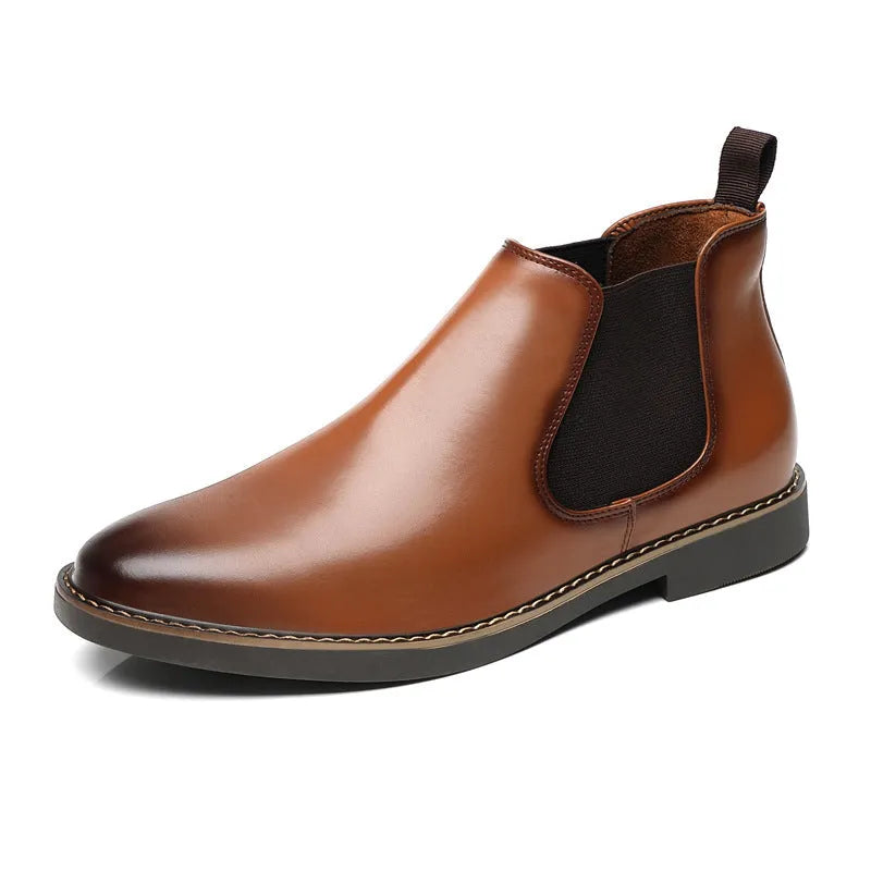 A pair of black formal pointed-toe leather boots with a square heel and rubber sole.