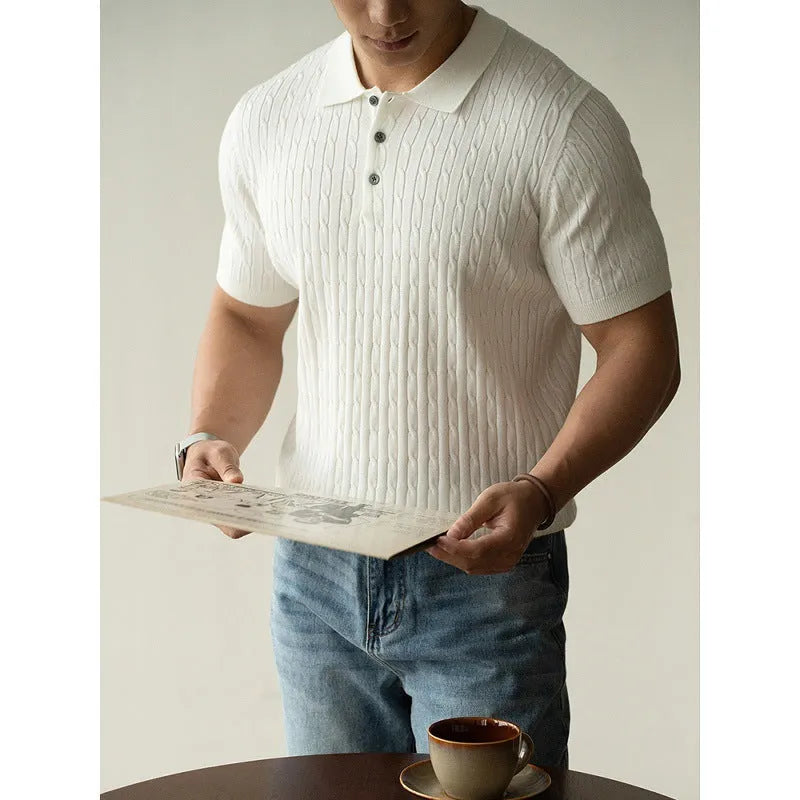 A man's khaki short-sleeve business commute top laid flat, showing its collar and sleeve detail.