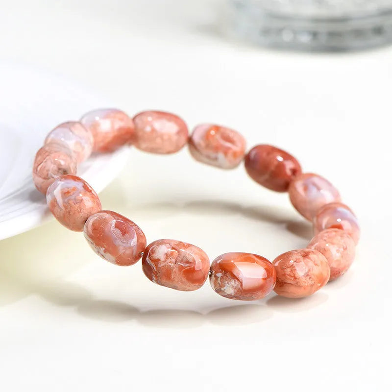 Natural cherry agate barrel bead bracelet with Ruyi design, 10x14mm beads on wrist
