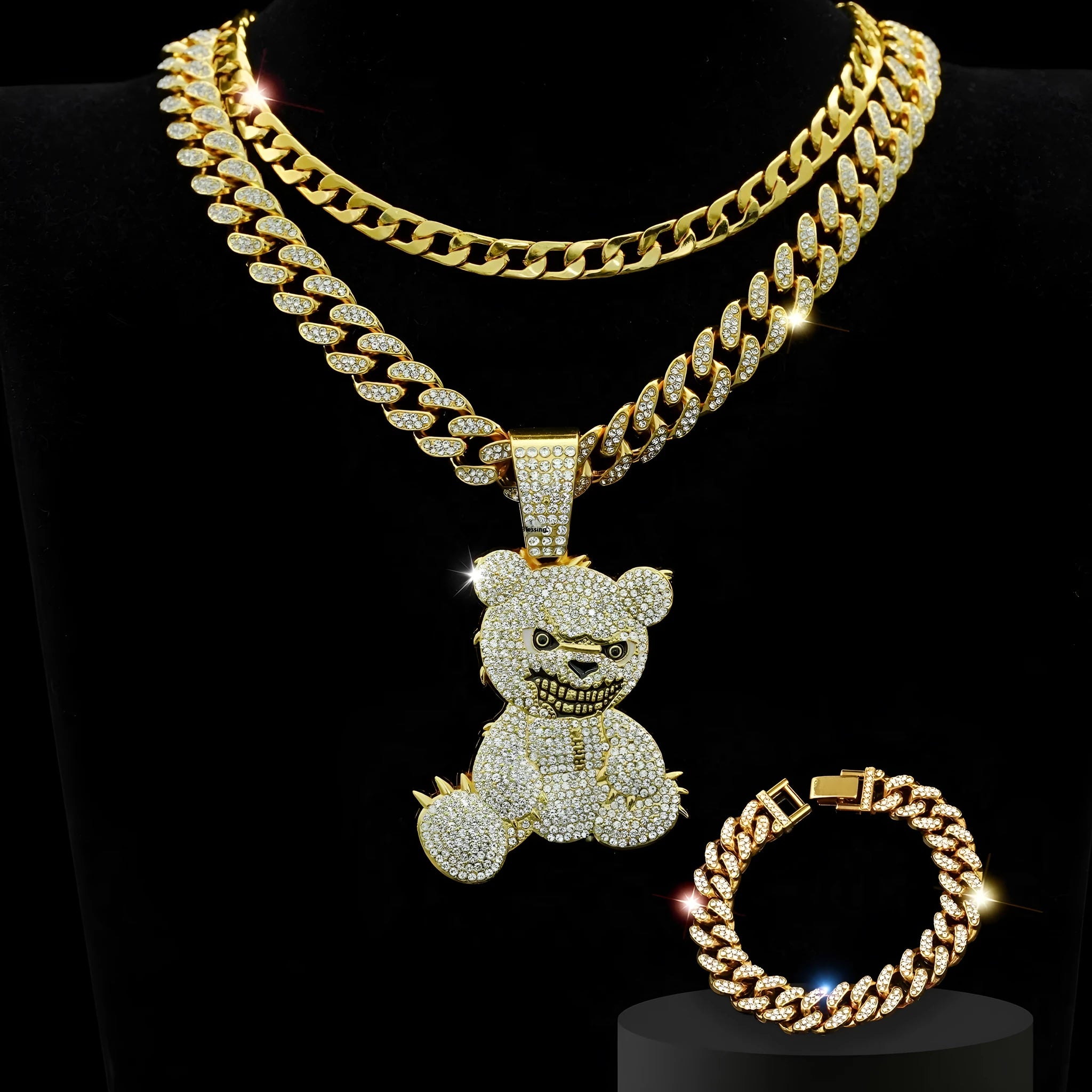 Gold three-piece jewellery set with rhinestone bear pendants on Cuban link chain necklaces and bracelet