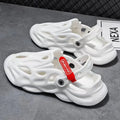 Solid colour EVA coconut slippers with closed toe, perforated upper, and thickened sole.