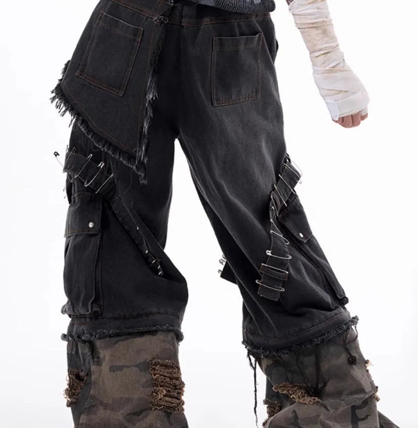 Men's grey camouflage jeans showing pin and ribbon splicing detail on the leg.