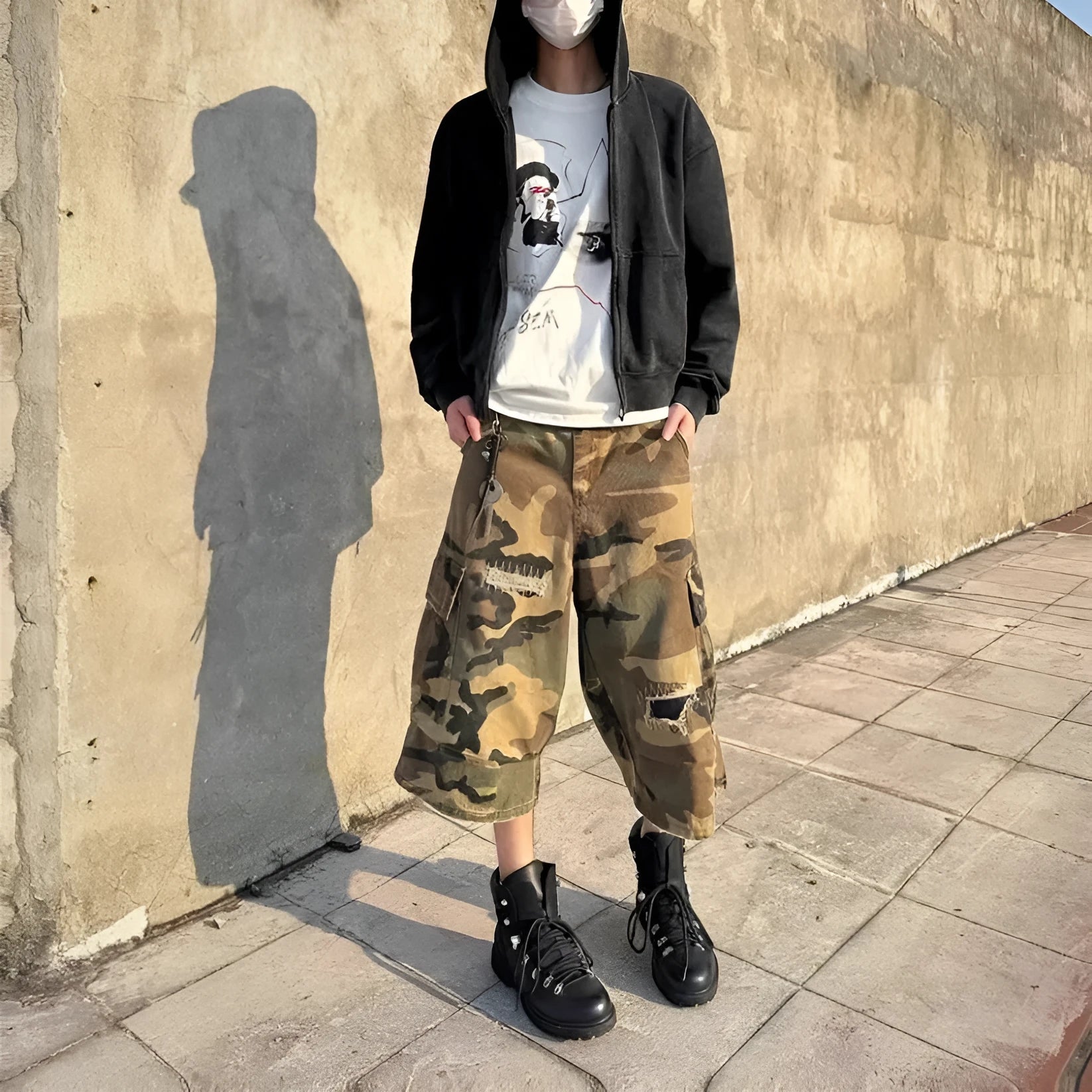 Men's camouflage cropped jeans with retro patch and ripped detailing in straight-leg loose fit