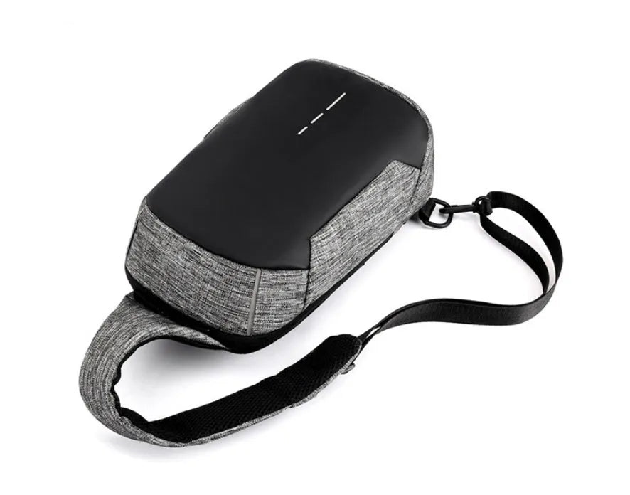 Dark blue waterproof oxford cloth chest bag showing front zipper and crossbody strap