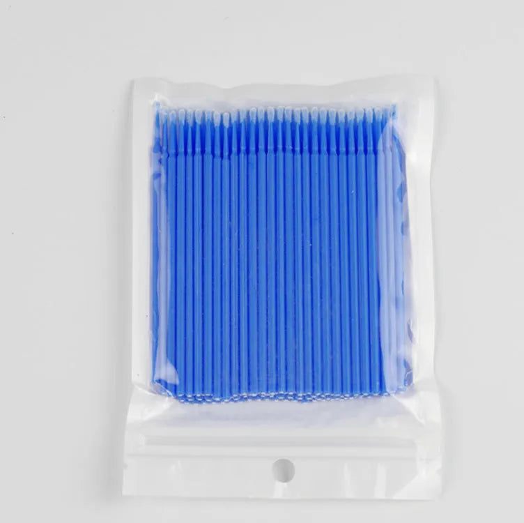 Disposable micro applicator brushes with bendable handles and flocked tips in assorted colours.