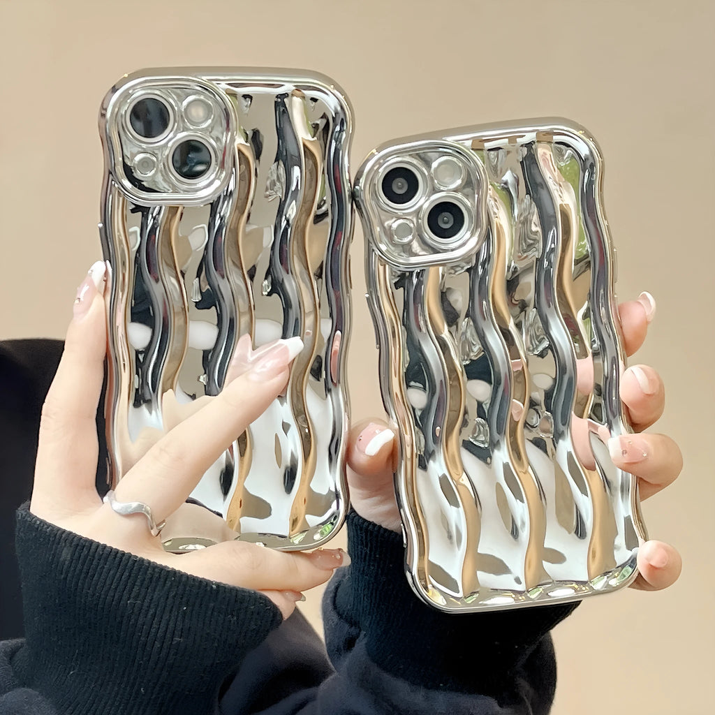 Silver electroplated iPhone 17 Pro Max case with raised three-dimensional wave stripe pattern on the back.