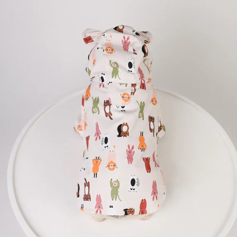 Beige cartoon dog raincoat with double waterproof PU coating, shown in small animal and cat head designs.