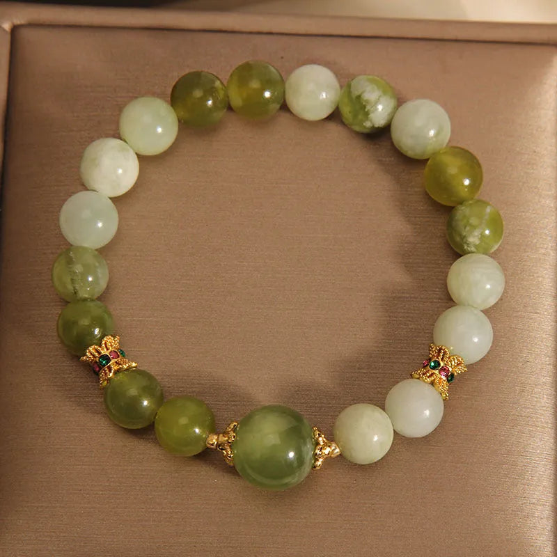 Women's bracelet made from green Xiuyan jade in a light luxury sweet Mori style.