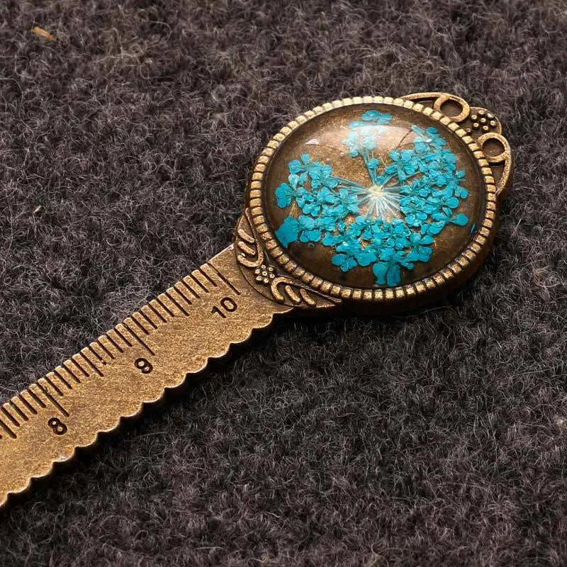 Handmade dried gypsophila flower bookmark ruler showing lace flowers, daffodils, and clovers on 12cm length