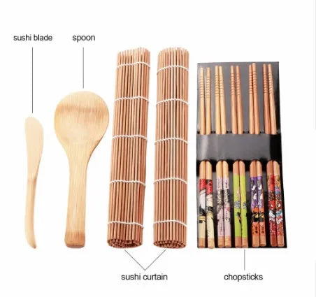 White plastic sushi tool set with moulds for rolls and Nigiri and a rice paddle on a light background