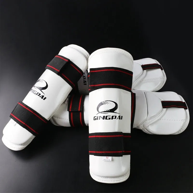 Taekwondo protective gear set showing arm guards and leg protectors with PU EVA foam construction