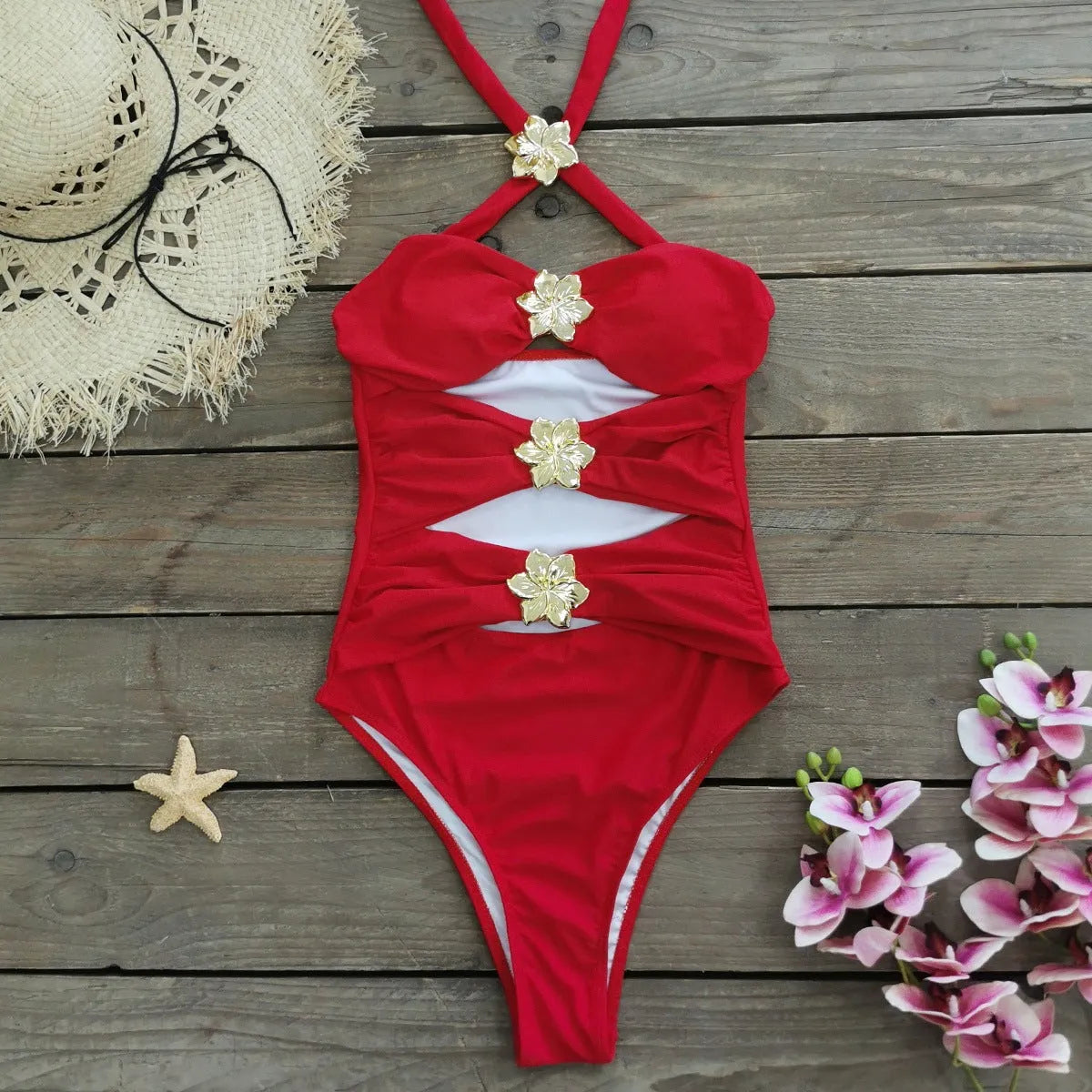 A solid colour one-piece swimsuit for women with a hollow-out tube top and a matching short skirt.