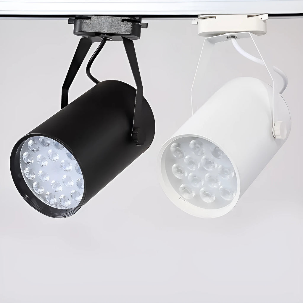 LED track spotlight with aluminium shell in black or white, for clothing store wall lighting.