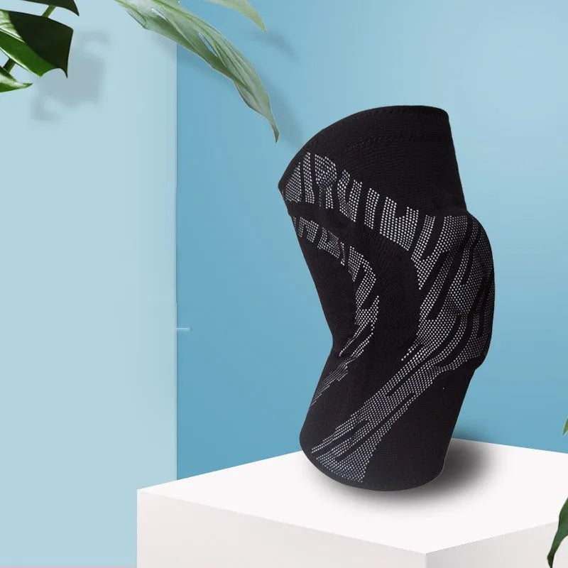 Black pressurised basketball knee pad showing elastic nylon construction for sports protection