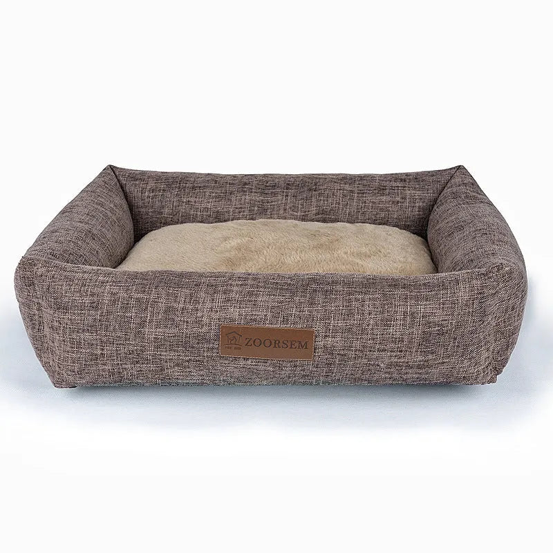 Square grey plaid cloth dog bed for medium-sized dogs on a wooden floor.