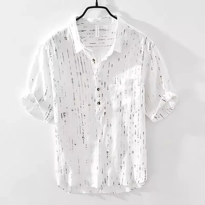 Men's loose fit short sleeve polo shirt in black, shown on a hanger.
