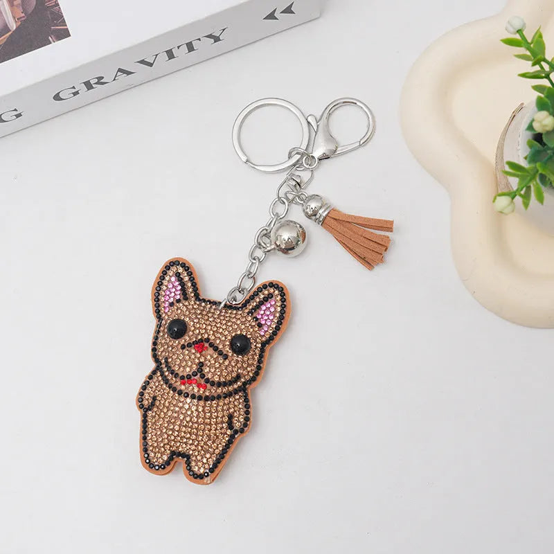 French dog rhinestone keychain with cartoon bear pendant in caramel colour.
