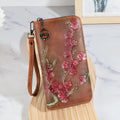 Chinese style embossed floral handbag with zipper closure in black, brown or coffee colours