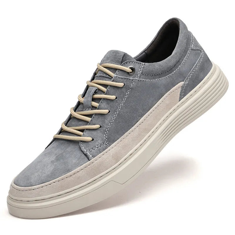 Men's grey casual skate shoes with pigskin upper and rubber sole, front lace-up design with round toe