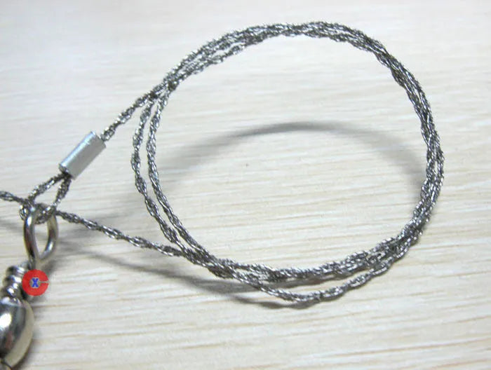 Survival wire saw with stainless steel blade, pull ring, and hoop handles for outdoor cutting