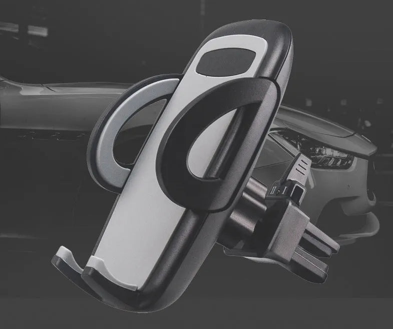 Black plastic car air conditioning vent mobile phone holder mounted on vehicle dashboard