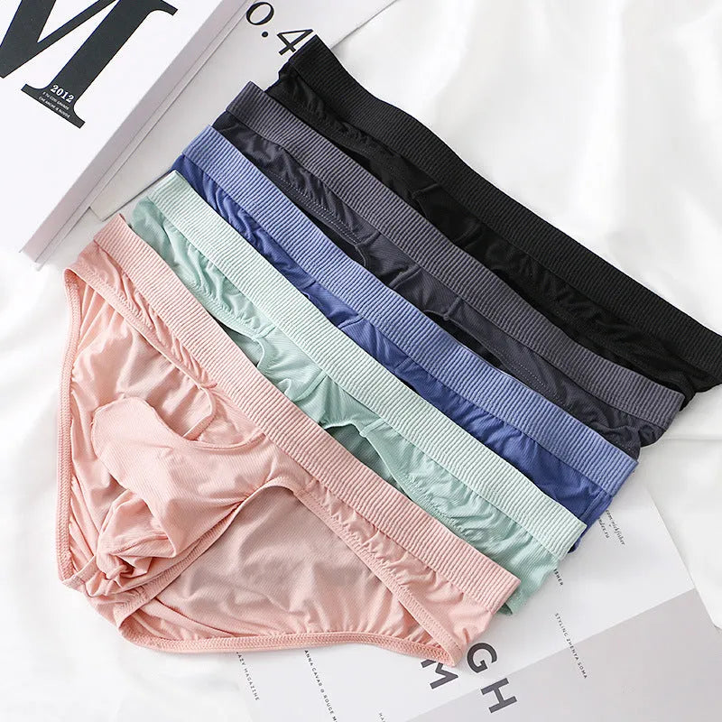 Men's low waist ice silk briefs in various colours on a white background