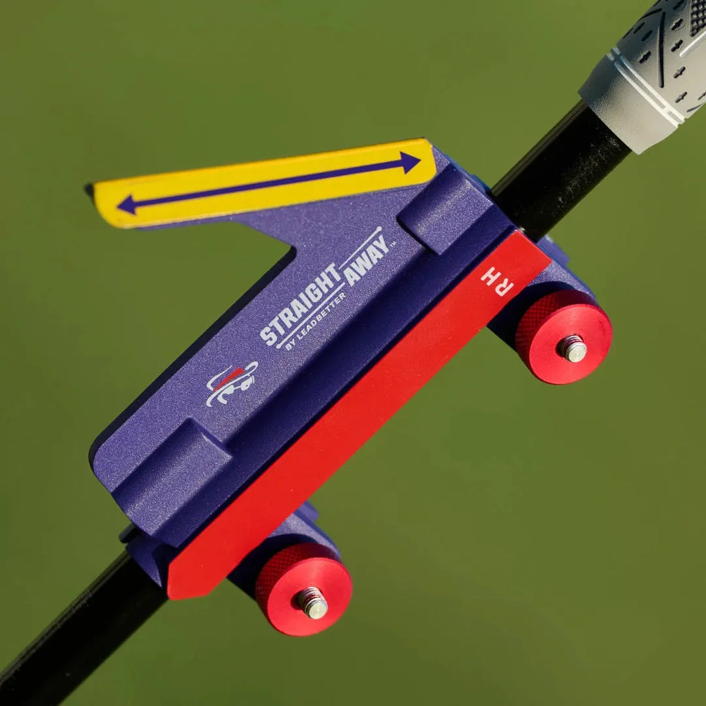 Plastic golf swing plane training simulator on practice surface