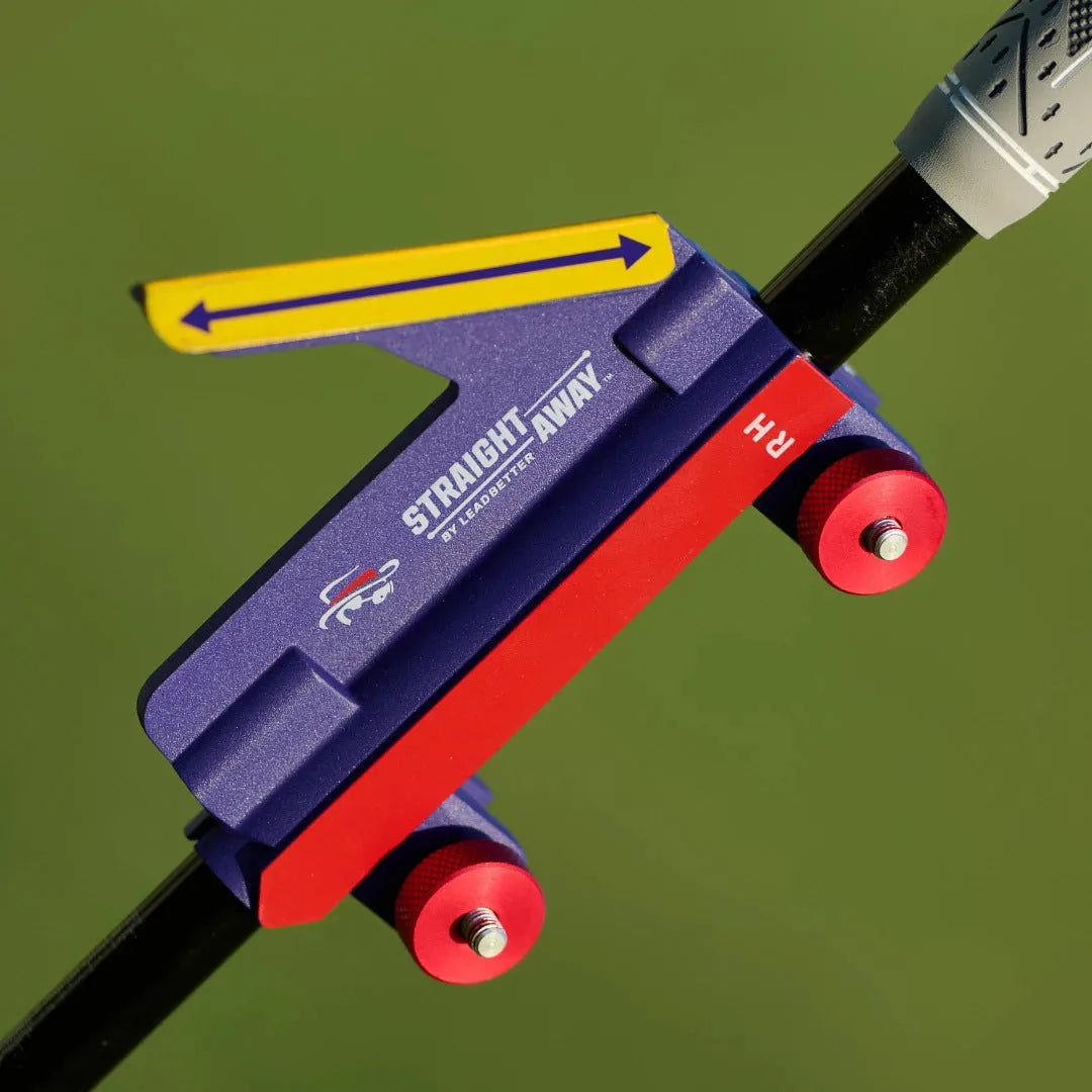 Plastic golf swing plane training simulator on practice surface