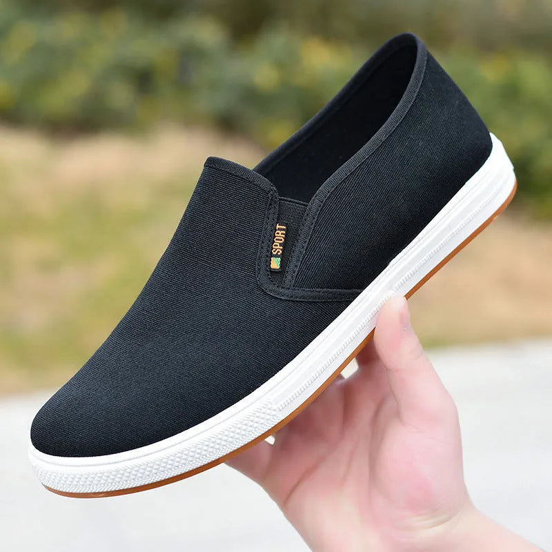 Men's black and blue canvas slip-on shoes with round toe and composite soles
