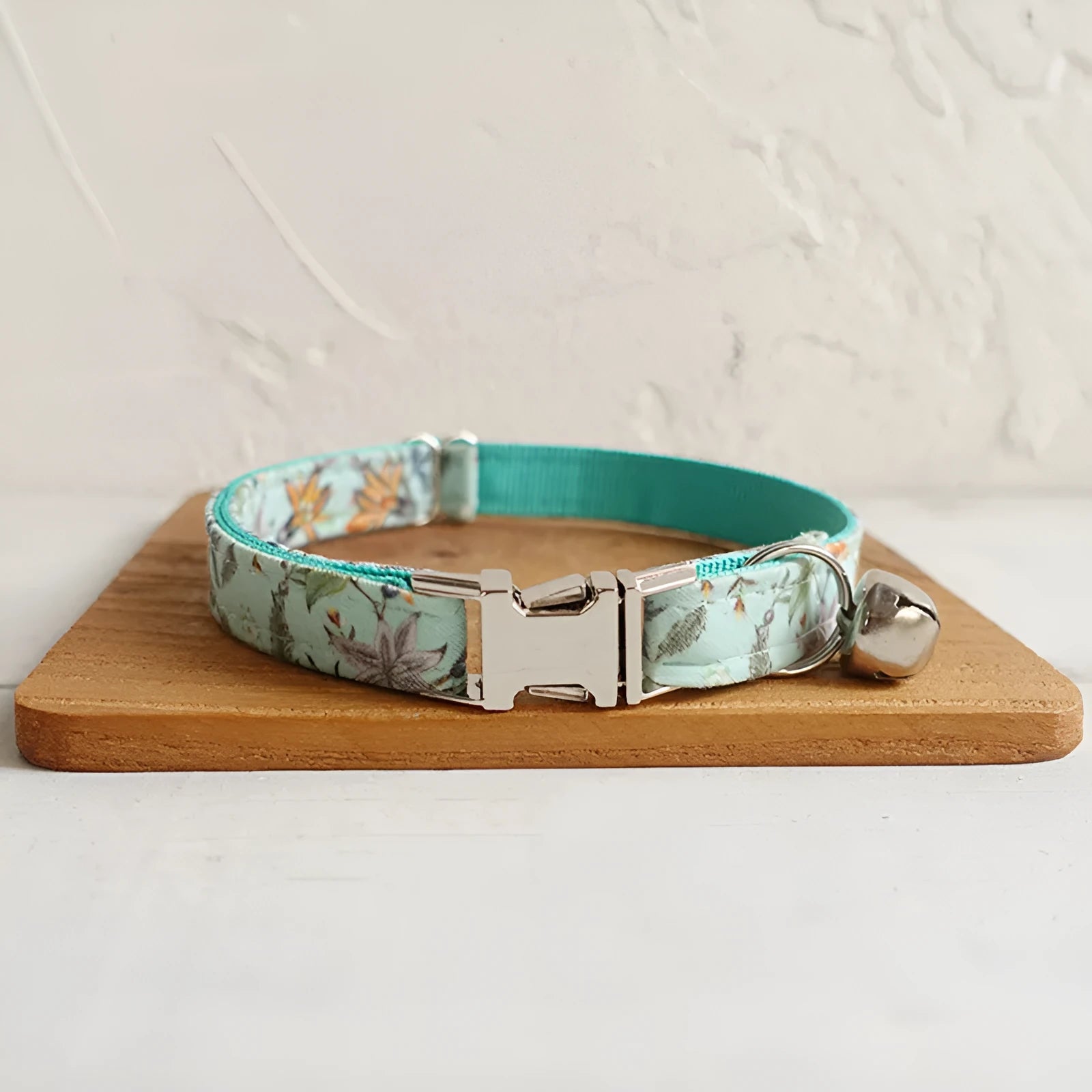 Green adjustable pet collar made from cloth and webbing, available in sizes L and S