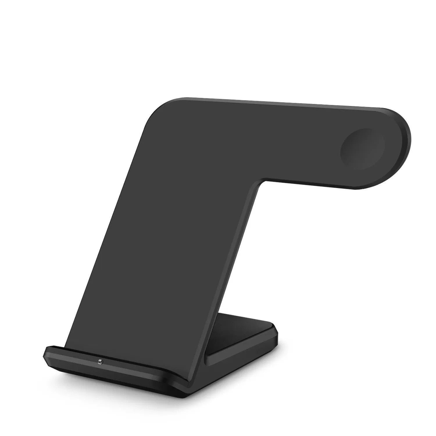 Black wireless charging pad on a wooden desk with smartphone placed on top, showing non-slip silicone base.