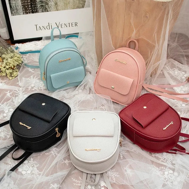 Women's small PU shoulder backpack purse in multiple colours with zipper closure