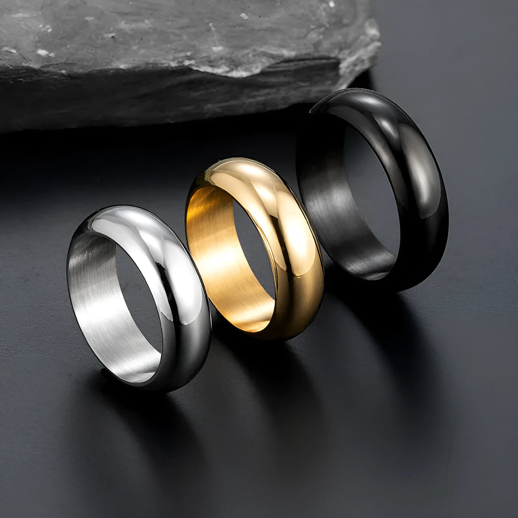 Glossy electroplated titanium steel ring shown in gold, black, and steel colours on size display