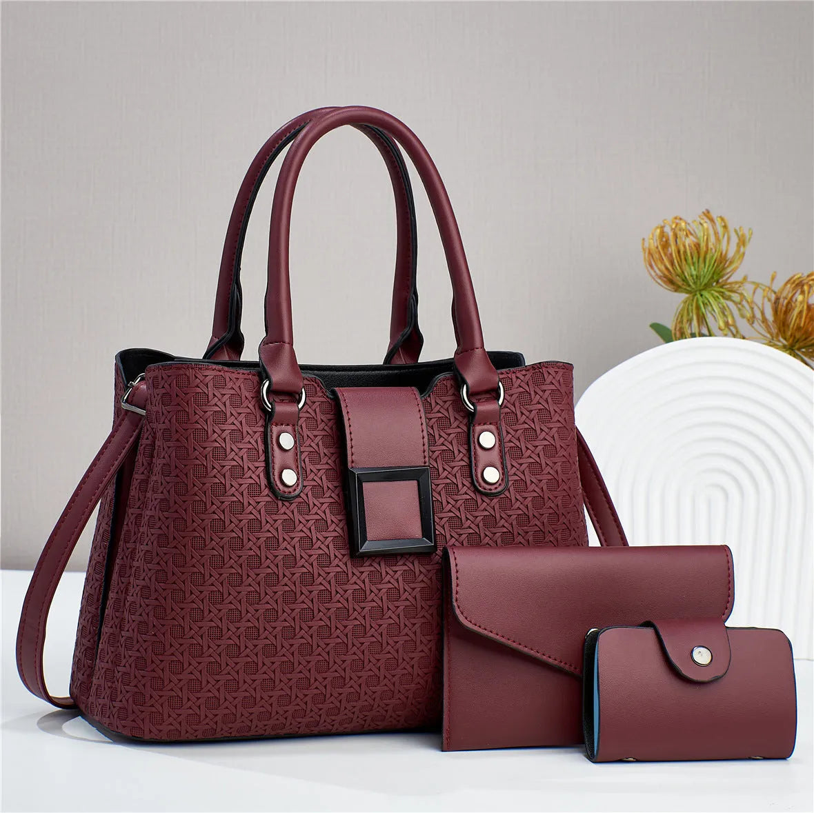 Three-piece women's crossbody bag set in seven colours with square vertical design and multiple compartments