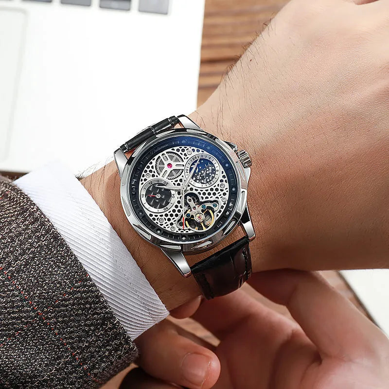 Men's automatic watch with black dial and steel bracelet showing luminous hands.