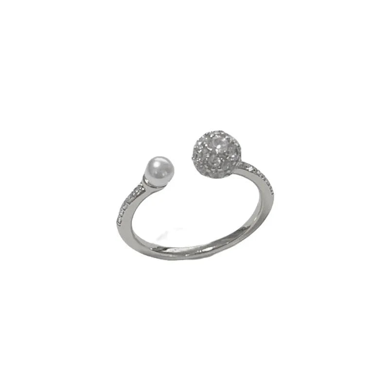 Open-end pearl ring with round zircon stones and thick gold plating in geometric shape design