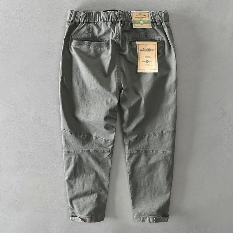 Men's casual Japanese overalls in cotton with elastic fabric, shown in khaki, black, light grey, and army green colours