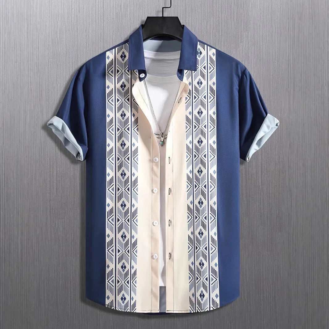 Man wearing a loose fit plaid short sleeve shirt with a lapel collar in a casual setting.