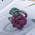 Black gold geometric ring with red corundum stones, female fashion jewellery
