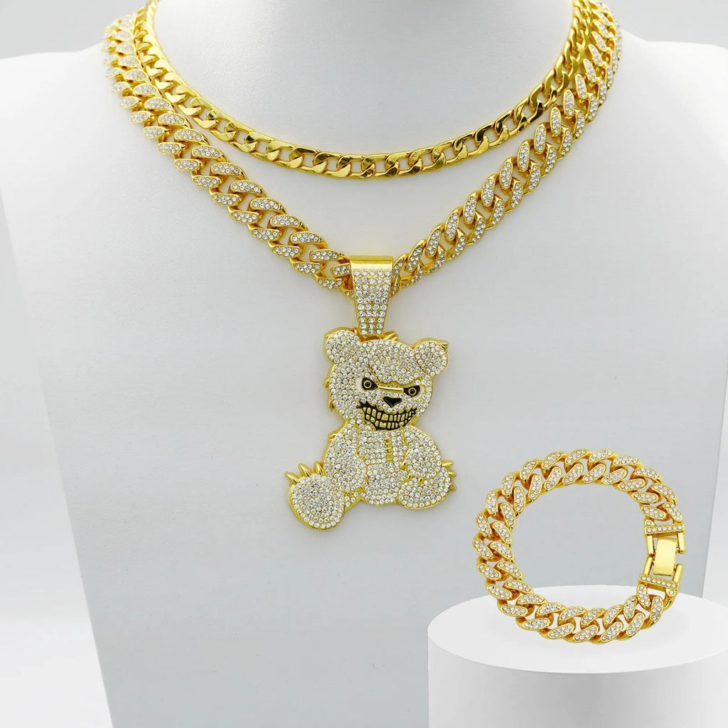 Gold three-piece jewellery set with rhinestone bear pendants on Cuban link chain necklaces and bracelet