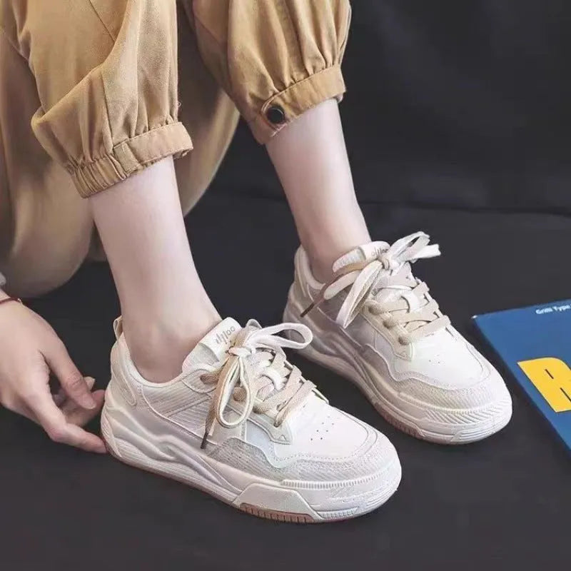 Pink and milky white low-top rubber sole sneakers with height increasing function