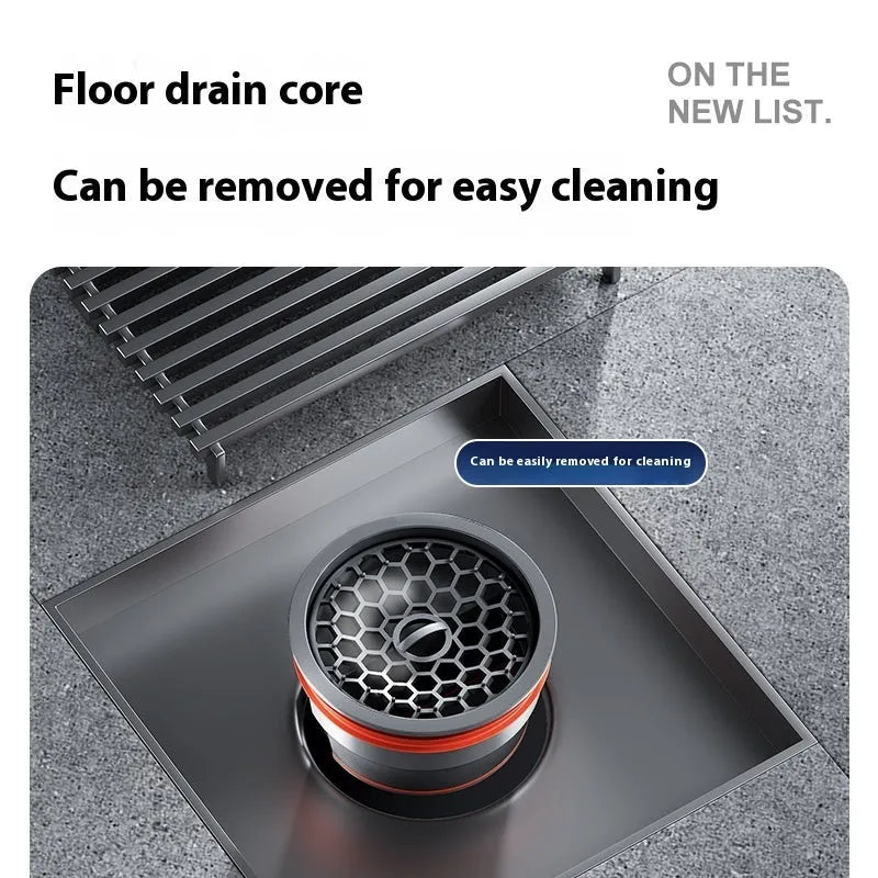Gun grey 304 stainless steel courtyard floor drain measuring 15cm by 15cm with visible grating.