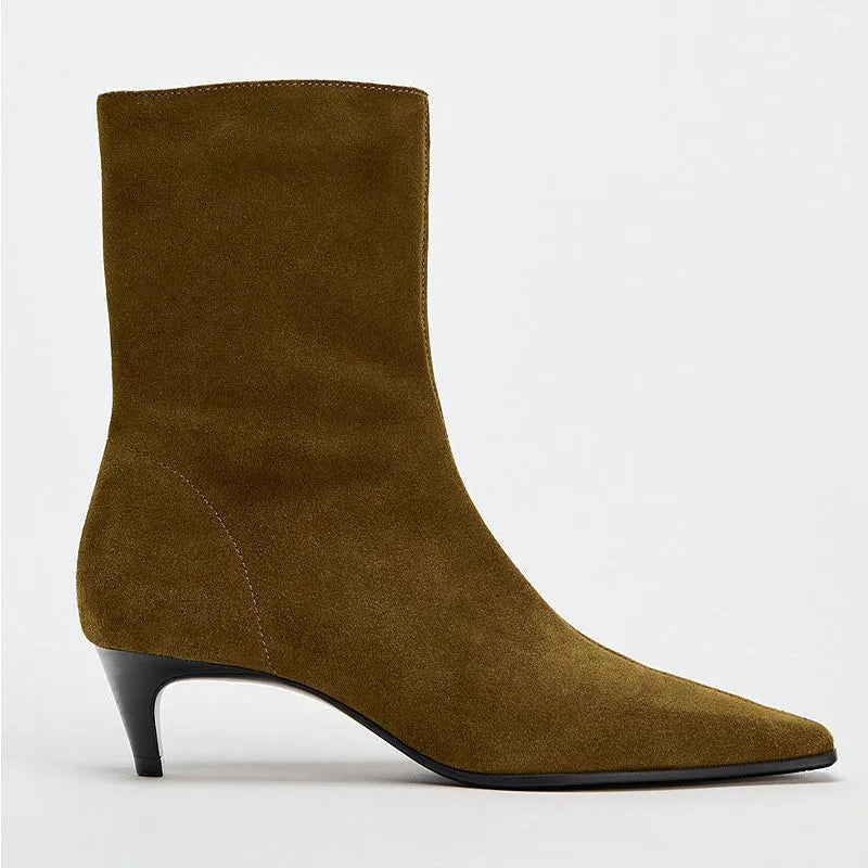 Brown square toe mid heel boots with side zip on a white background.