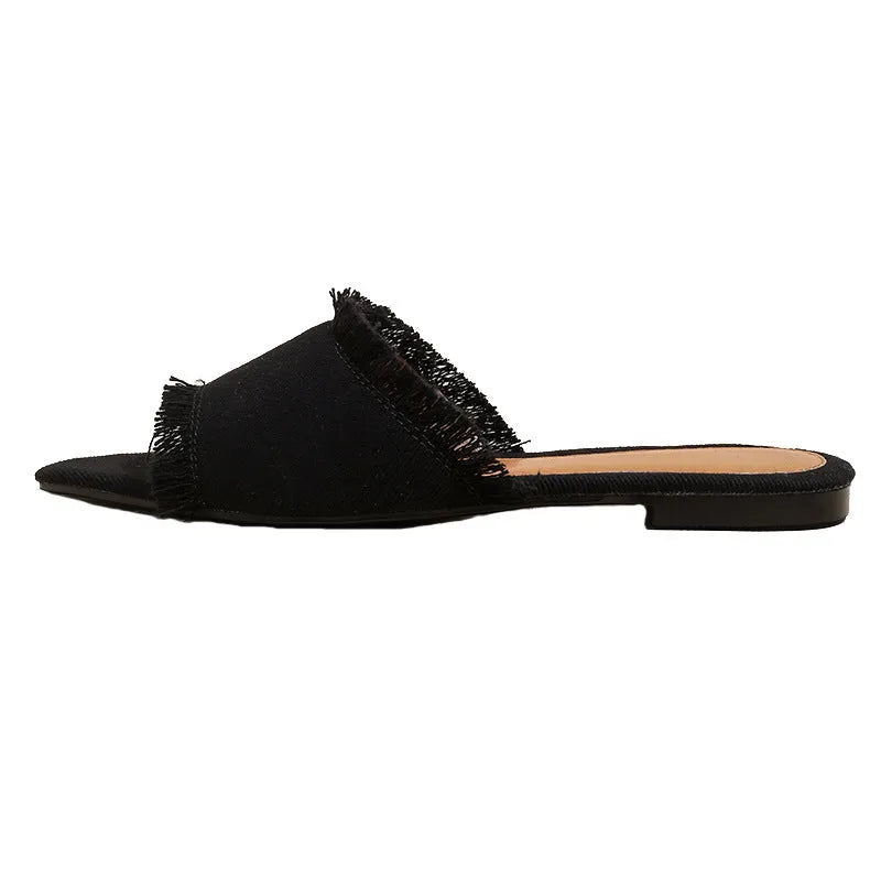 Women's denim flat slippers with a tassel detail and leather lining in a choice of colours.