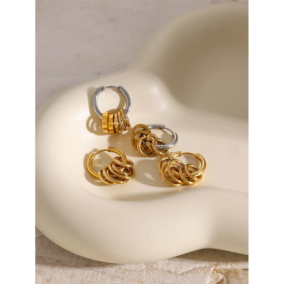 Gold electroplated stainless steel earrings with contemporary ins-style design