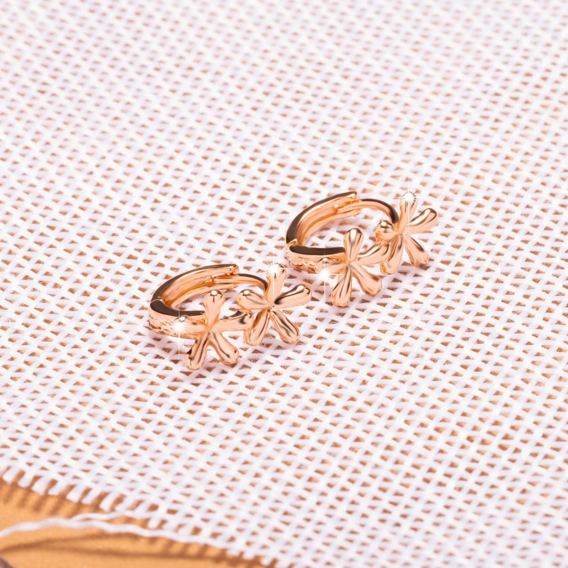 Rose gold circular waterdrop flower earrings with electroplated finish