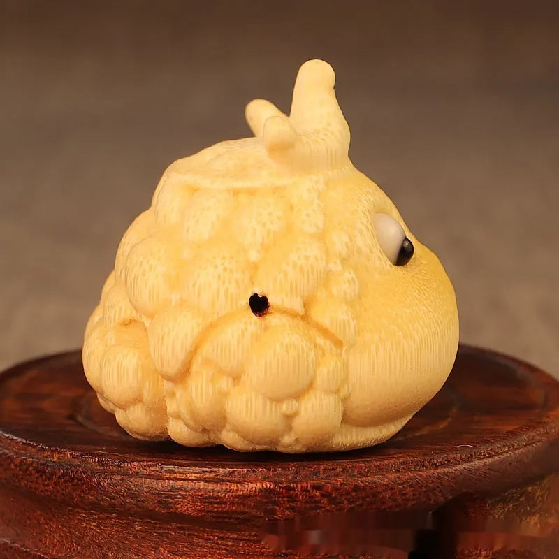 Solid bamboo carving of a Crown Princess toad ornament