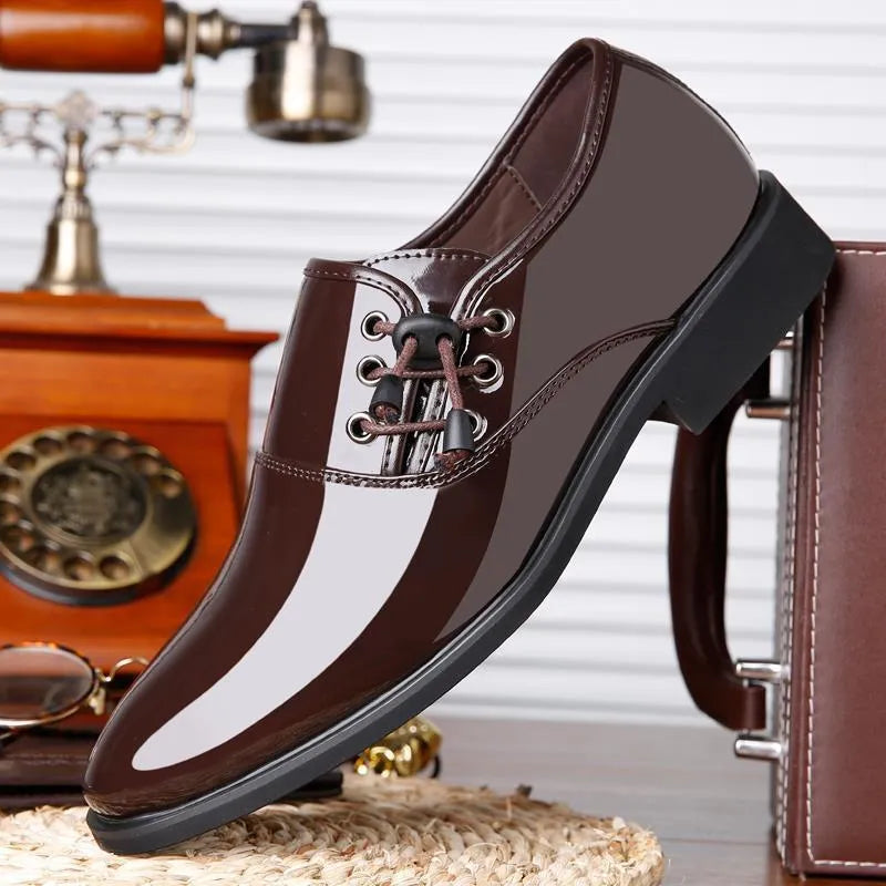 Men's black and brown formal business shoes with round toe and square heel on a rubber sole
